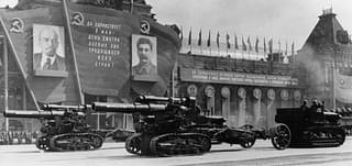 Heavy artillery on parade during a review of the Moscow Garrison troops in Red Square, passing posters of Lenin and Stalin. (N. Sitnikov/Hulton Archive/Getty Images)