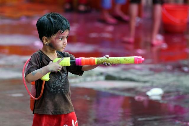 Children enjoy as they celebrate holi at Sion in Mumbai. (Kunal Patil/Hindustan Times via GettyImages)&nbsp;