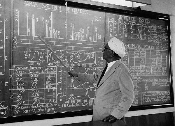 Sir C V Raman pointing to information on a large blackboard as he gives a lecture, 5 August 1958. (Keystone Features/Hulton Archive/Getty Images)