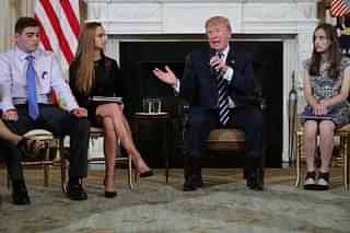 US President Donald Trump (C) speaks during a listening session with Marjory Stoneman Douglas High School students who survived the mass shooting in Florida. (Chip Somodevilla/Getty Images)