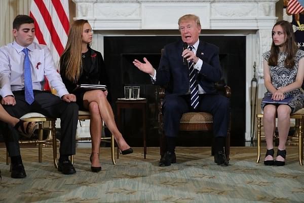 US President Donald Trump (C) speaks during a listening session with Marjory Stoneman Douglas High School students who survived the mass shooting in Florida. (Chip Somodevilla/Getty Images)