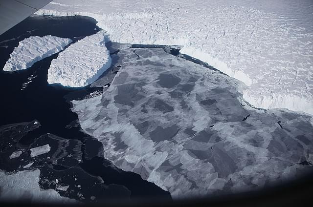  Ice floats near the coast of West Antarctica as viewed from a window of a NASA Operation IceBridge airplane on October 28, 2016 in-flight over Antarctica. (Mario Tama/Getty Images)