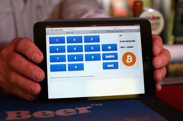 Meanwhile, cryptocurrency acceptance is growing throughout the world, despite uncertainties. (Cameron Spencer via Getty Images)