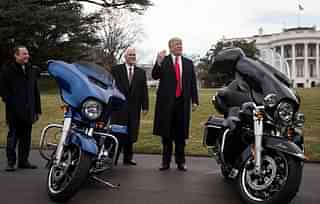 US President Donald Trump (R) after a meeting with Harley Davidson representatives at the White House. (Drew Angerer via Getty Images)