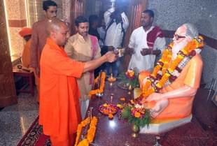 Chief Minister of Uttar Pradesh and Mahant of Gorakhdham Temple Yogi Adityanath performing puja of Brammhlin Guru Awaidhnath at Gorakhnath Temple (Deepak Gupta/Hindustan Times via GettyImages)