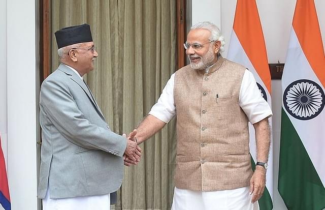 Nepalese Prime Minister Khagda Prasad Sharma Oli with Prime Minister Narendra Modi. (GettyImages)