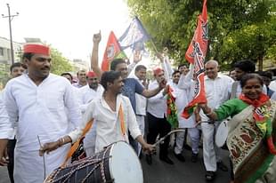 SP workers along with BSP members celebrate after winning the Lok Sabha election seats in Uttar Pradesh in Noida. (Sunil Ghosh/Hindustan Times via Getty Images)