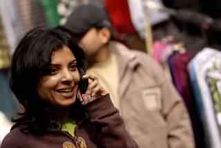 A woman talking on her mobile phone at Chandani Chowk market in New Delhi. (Pradeep Gaur/Mint via Getty images)&nbsp;