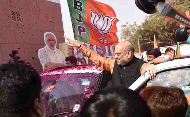 BJP Chief Amit Shah celebrates their lead in North Eastern States Elections at BJP Headquarters, DDU Marg, on March 03, 2018 in New Delhi (Sanchit Khanna/Hindustan Times via Getty Images)