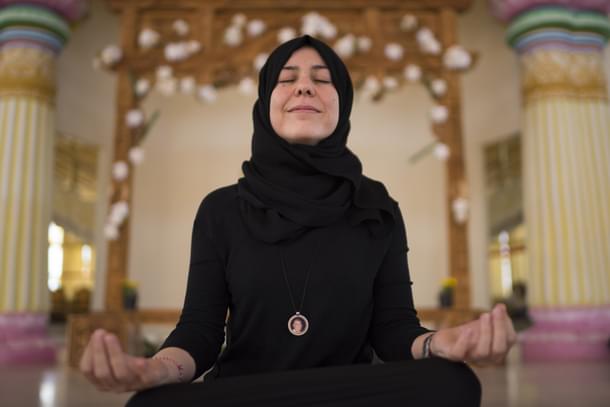 Basma is now an Art of Living instructor helping Yazidi girls in refugee camps overcome their trauma through yogic breathing techniques and meditation.