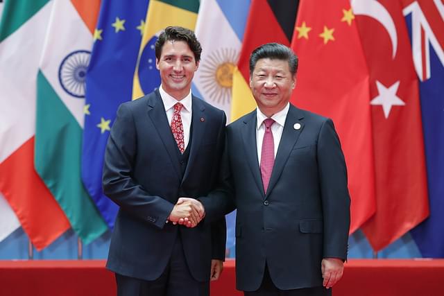 Justin Trudeau and Xi Jinping in 2016 (Lintao Zhang/Getty Images)