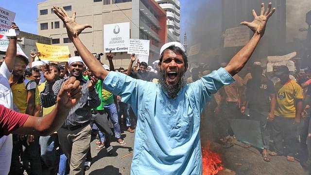 An effigy of former US President Barack Obama  burnt by Muslims in Colombo. 