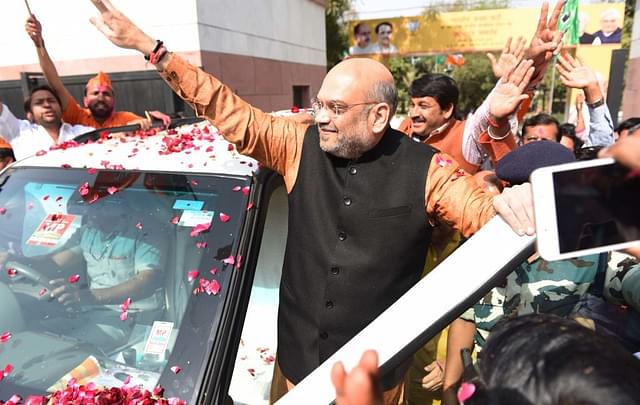 BJP chief Amit Shah arrives at the party headquarters to celebrate BJP’s solid performance in Tripura, Meghalaya and Nagaland.&nbsp; (Sanchit Khanna/Hindustan Times via Getty Images)