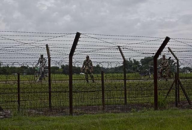 A border fence between India and Bangladesh. (Shazia Rahman via GettyImages)