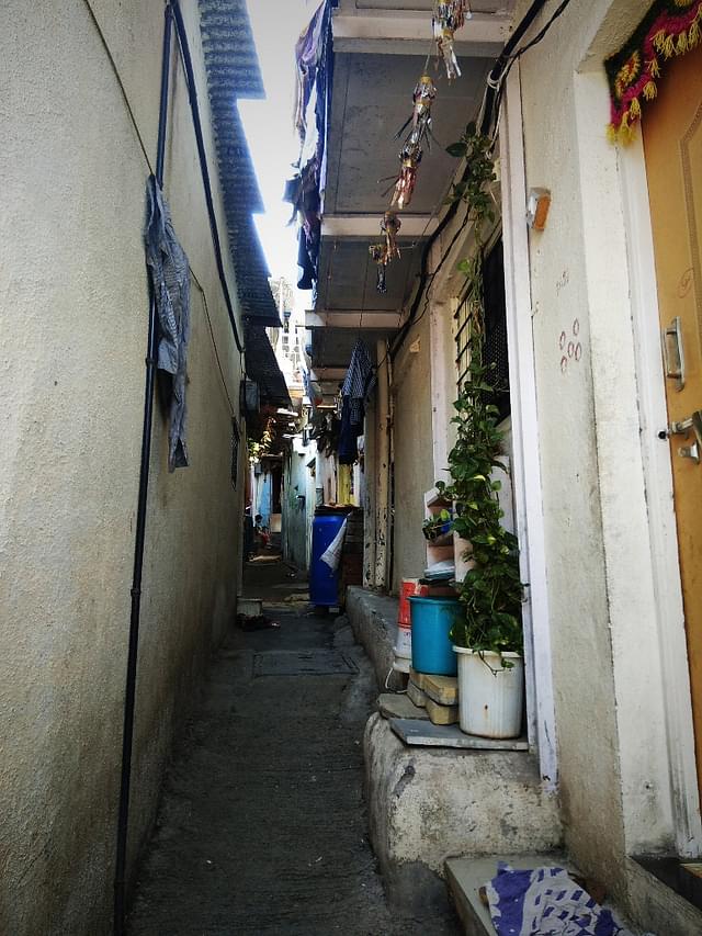 The narrow lanes serve as the immediate open playing space for children.