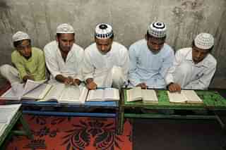 Muslim children reciting verses from Quran. (Burhaan Kinu/Hindustan Times via Getty Images)&nbsp;