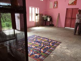 Inside the one-room Devasthan. View from the raised platform where idols are kept. The 4X3 feet iron table is the one beneath which the the eight-year-old girl was allegedly kept 