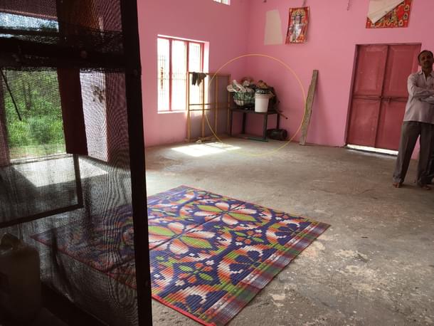 Inside the one-room Devasthan. View from the raised platform where idols are kept. The 4X3 feet iron table is the one beneath which the the eight-year-old girl was allegedly kept
