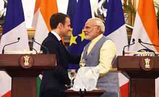Prime Minister Narendra Modi and French President Emmanuel Macron during the ISA summit at Hyderabad House in New Delhi. (Mohd Zakir/Hindustan Times via GettyImages)