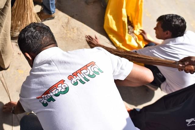 Swachh Bharat volunteers in New Delhi. (Burhaan Kinu/Hindustan Times via Getty Images)
