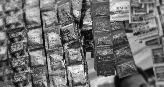 Gutka packets hanging from a shop