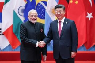 Chinese President Xi Jinping with Prime Minister Narendra Modi. (Lintao Zhang via Getty Images)