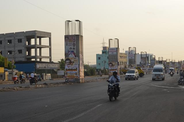 Pillars of the stalled Maduravoyal-Chennai Port elevated corridor on the Chennai-Bengaluru National Highway near Koyambedu.