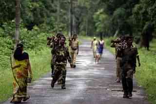 Police personnel conduct an area domination exercise in Gadchiroli. (Satish Bate/Hindustan Times via Getty Images)