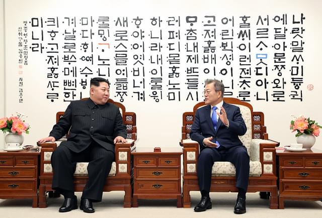 Supreme Leader of North Korea Kim Jong-un and President of South Korea Moon Jae-In (Korea Summit Press Pool/Getty Images)
