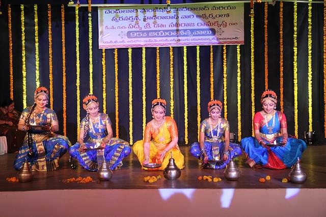 A dance troupe performs