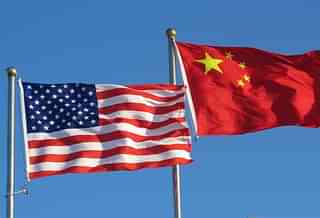 American and Chinese flags.&nbsp;