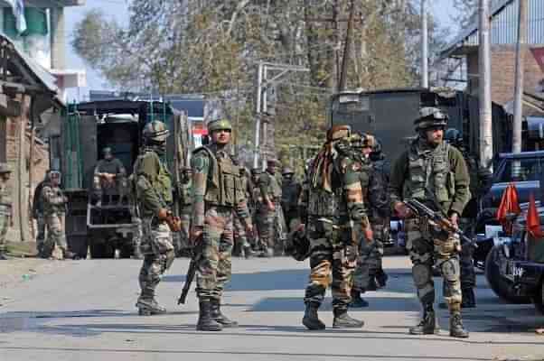 Army soldiers during a gun battle between terrorists and security forces in Shopian, South Kashmir, in Srinagar, J&K. (Waseem Andrabi/Hindustan Times via Getty Images)