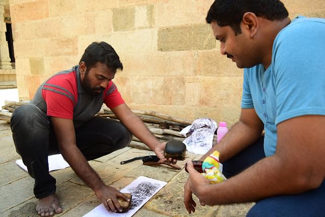 Inscriptions being recorded