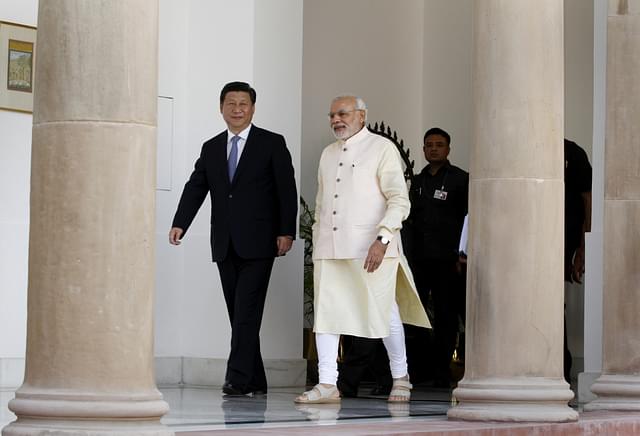 Prime Minister Narendra Modi with Chinese President Xi Jinping (Arvind Yadav/Hindustan Times via Getty Images)
