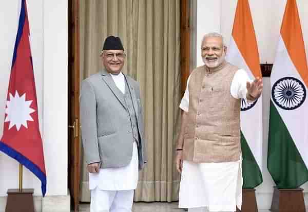 Prime Minister Narendra Modi (R) with Nepal Prime Minister Khadga Prasad Sharma Oli (Sonu Mehta/Hindustan Times via Getty Images)