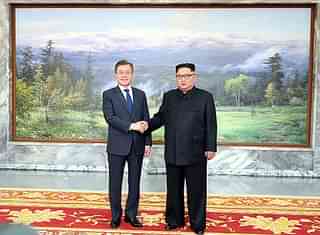 South Korean President Moon Jae-In with North Korean Supreme Leader Kim Jong-un at their second summit on 26 May in Panmunjom in North Korea (South Korean Presidential Blue House via Getty Images)