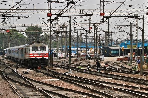 The passenger train sets off during the trial run of a ‘semi-bullet train’ between New Delhi and Agra from New Delhi railway station. (Arun Sharma/Hindustan Times via Getty Images)