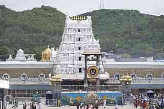 Facade of Tirumala Venkateshwar <i>garbhagriha</i> in the background. (Nikhil B/Wikimedia Commons)