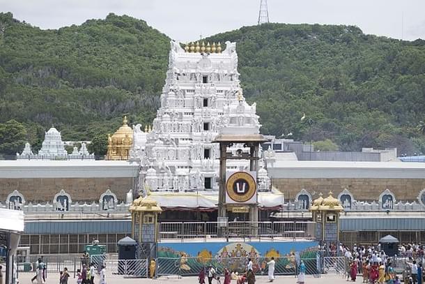 Facade of Tirumala Venkateshwar <i>garbhagriha</i> in the background. (Nikhil B/Wikimedia Commons)