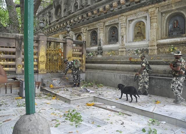 Security personnel stand guard the campus of Mahabodhi Temple after the series of blast. (Arun Abhi/Hindustan Times via Getty Images)