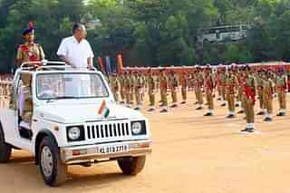 Kerala Chief Minister Pinarayi Vijayan observes a police ceremony. (pic via Kerala Police site)