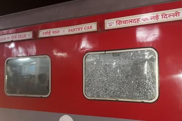 The Rajdhani Express’ shattered glass. (pic via Twitter)