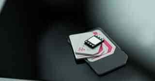 An e-Sim stacked on top of other SIM cards (T-Mobile US)