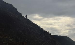 Local rag pickers working at Bhalswa landfill in New Delhi. (Raj K Raj/Hindustan Times via Getty Images)