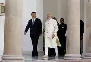 Chinese President Xi Jinping with PM Modi. (Arvind Yadav/Hindustan Times via Getty Images)