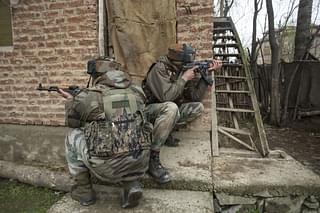 Security forces engaged in a gun-battle in Kashmir. (Waseem Andrabi/Hindustan Times via Getty Images)