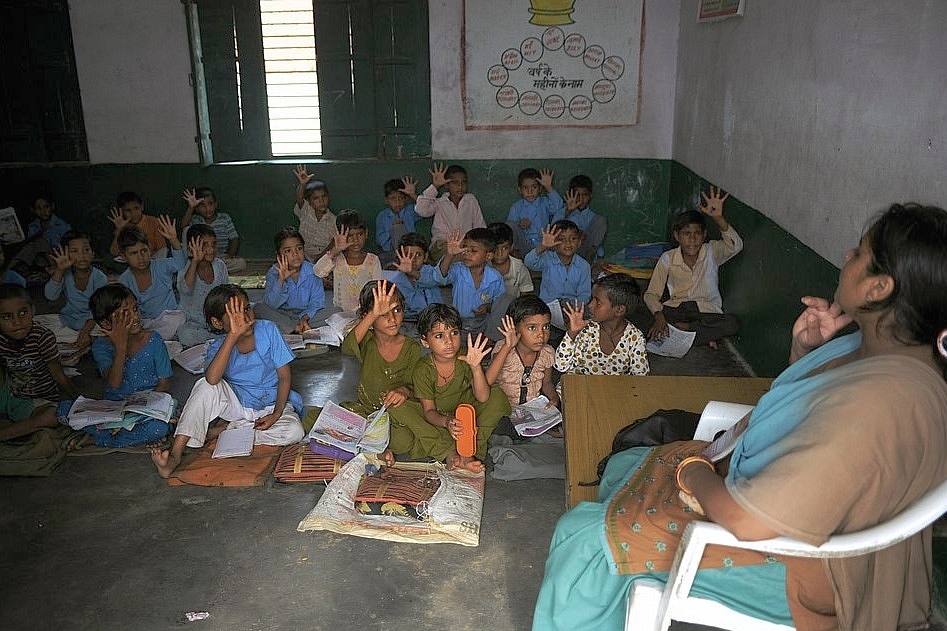 Indian school children read in a classroom at a government school in Bagpath district in Uttar Pradesh. (Representative Image/SAJJAD HUSSAIN/AFP/Getty Images)