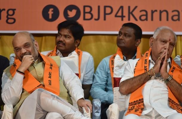 BJP President Amit Shah (L) and Karnataka Chief Minister B S Yeddyurappa. (Arijit Sen/Hindustan Times via Getty Images)