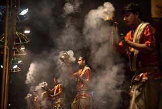 Hindu priests perform the Ganga <i>aarti</i> on the Ganges River in Varanasi (Getty Images)