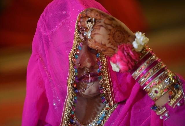 A child bride in Pakistan. (RIZWAN TABASSUM/AFP/Getty Images)